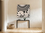 Cream Chrysanthemum Relief floral canvas print on the wall of a hallway