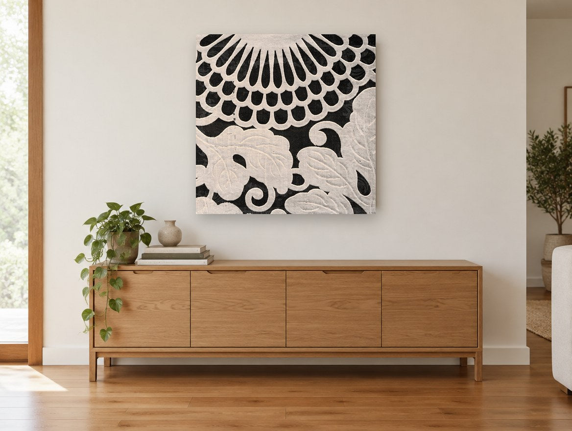 Cream Chrysanthemum Relief floral canvas print on the wall of a living room above a sideboard