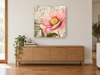 Pink Bloom Paris Postcard floral canvas print on the wall of a living room above a sideboard