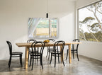 Open Window Beach coastal canvas print on the wall of a dining room