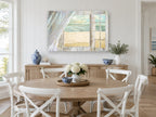 Open Window Beach coastal canvas print on the wall of a Hamptons dining room