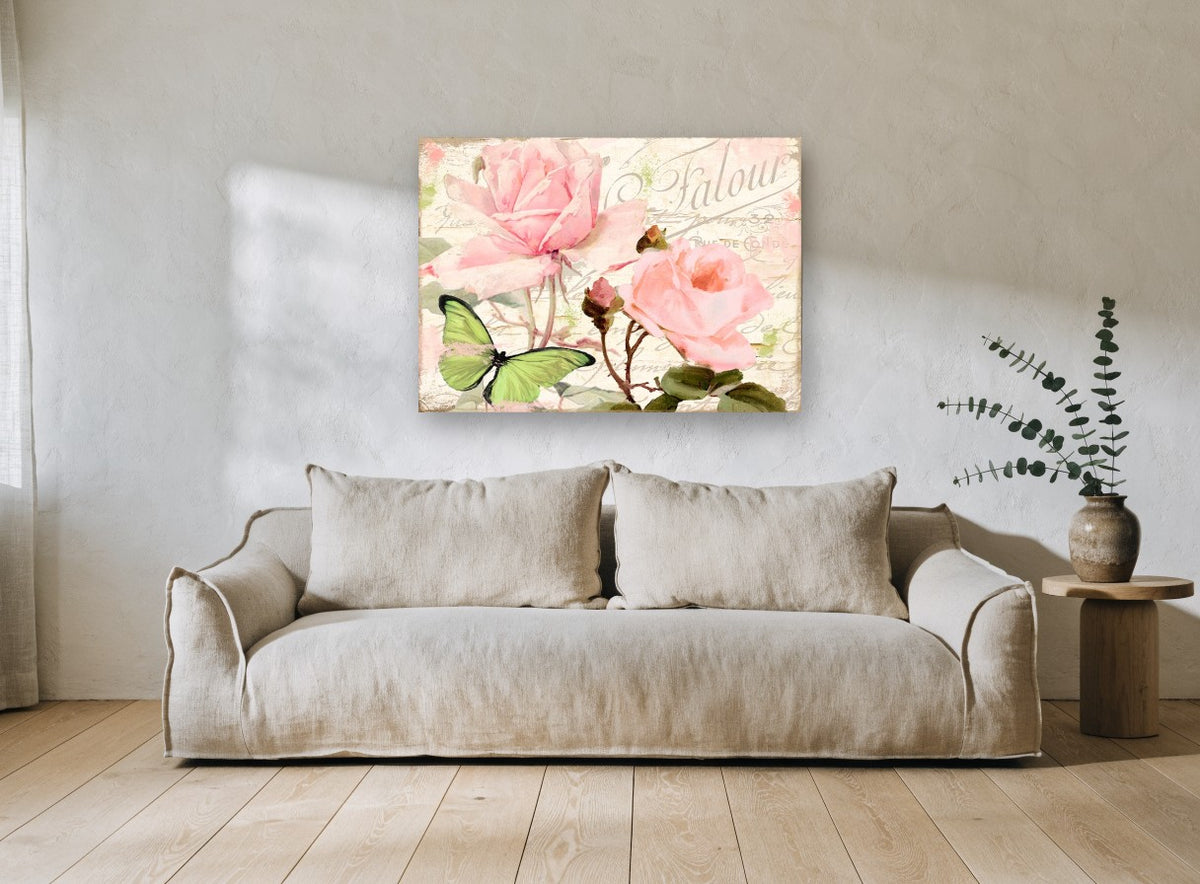 Blush Garden Butterfly Whisper floral canvas print on the wall of a living room