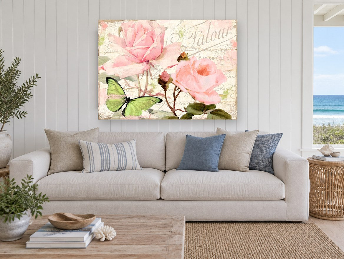 Blush Garden Butterfly Whisper floral canvas print on the wall of a beach house living room