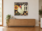 White Rooster and Sunflower floral canvas print on the wall of a living room above a sideboard