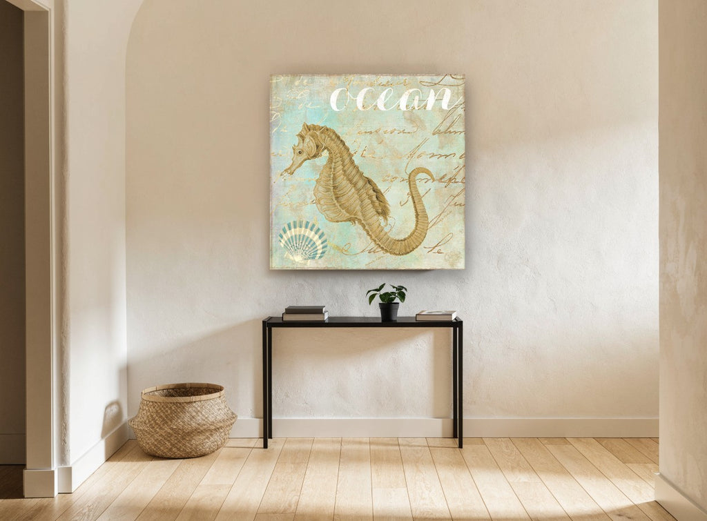 Golden Seahorse Script coastal canvas print on the wall of a hallway
