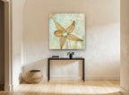 Starfish Shore Script coastal canvas print on the wall of a hallway