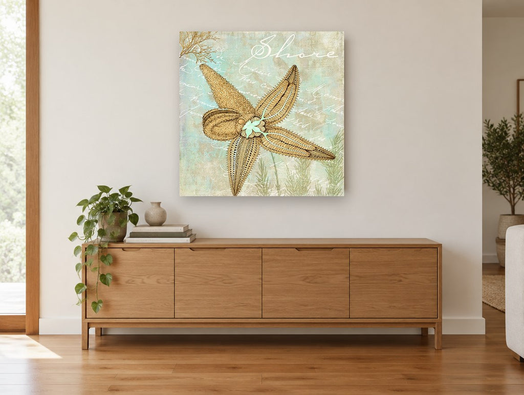 Starfish Shore Script coastal canvas print on the wall of a living room above a sideboard