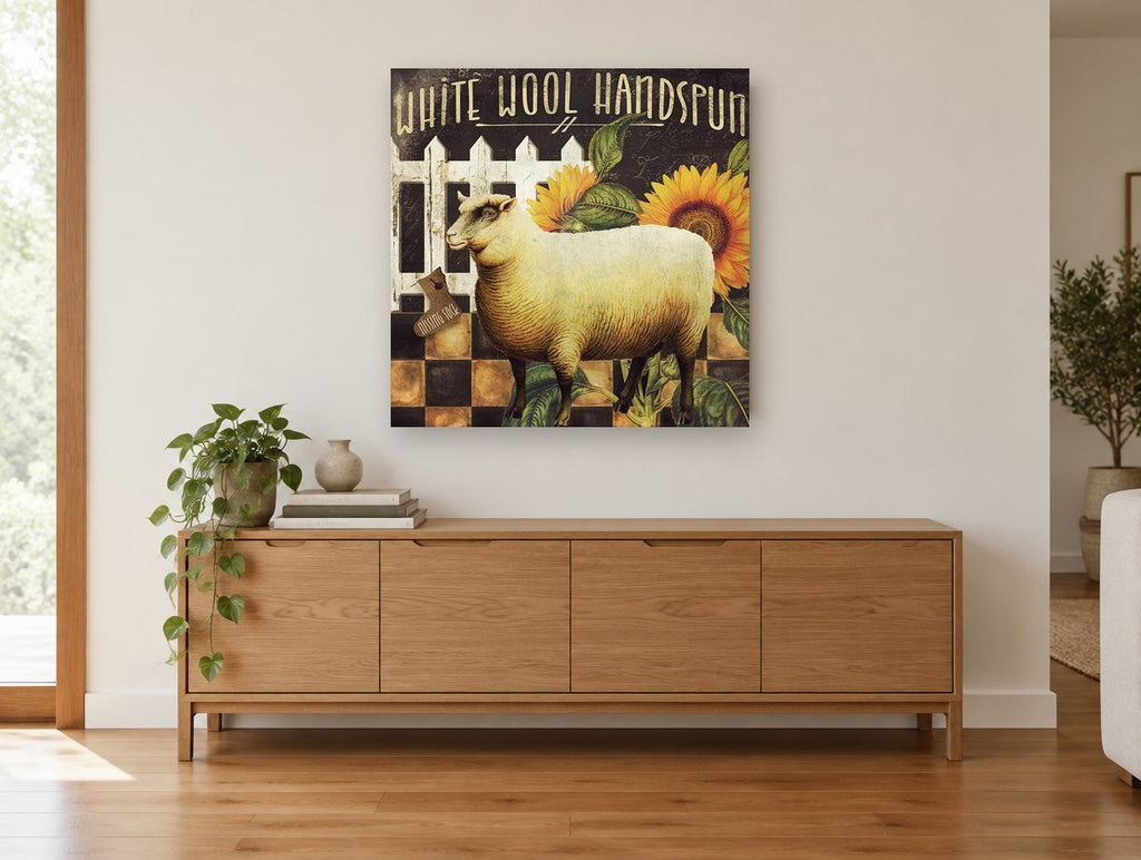 Handspun Sheep and Sunflowers floral canvas print on the wall of a living room above a sideboard