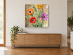 Four Daisies on Damask floral canvas print on the wall of a living room above a sideboard