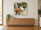 Peach Branch Damask Collage kitchen canvas print on the wall of a living room above a sideboard