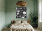 Singing Owl Cabin animal canvas print on the wall of a bedroom