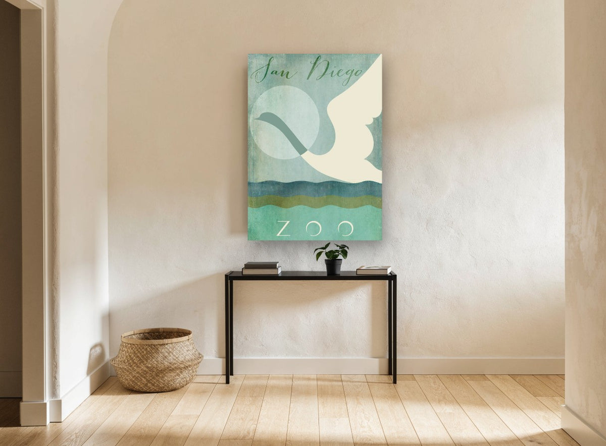 Swan Over Teal Waves animal canvas print on the wall of a hallway