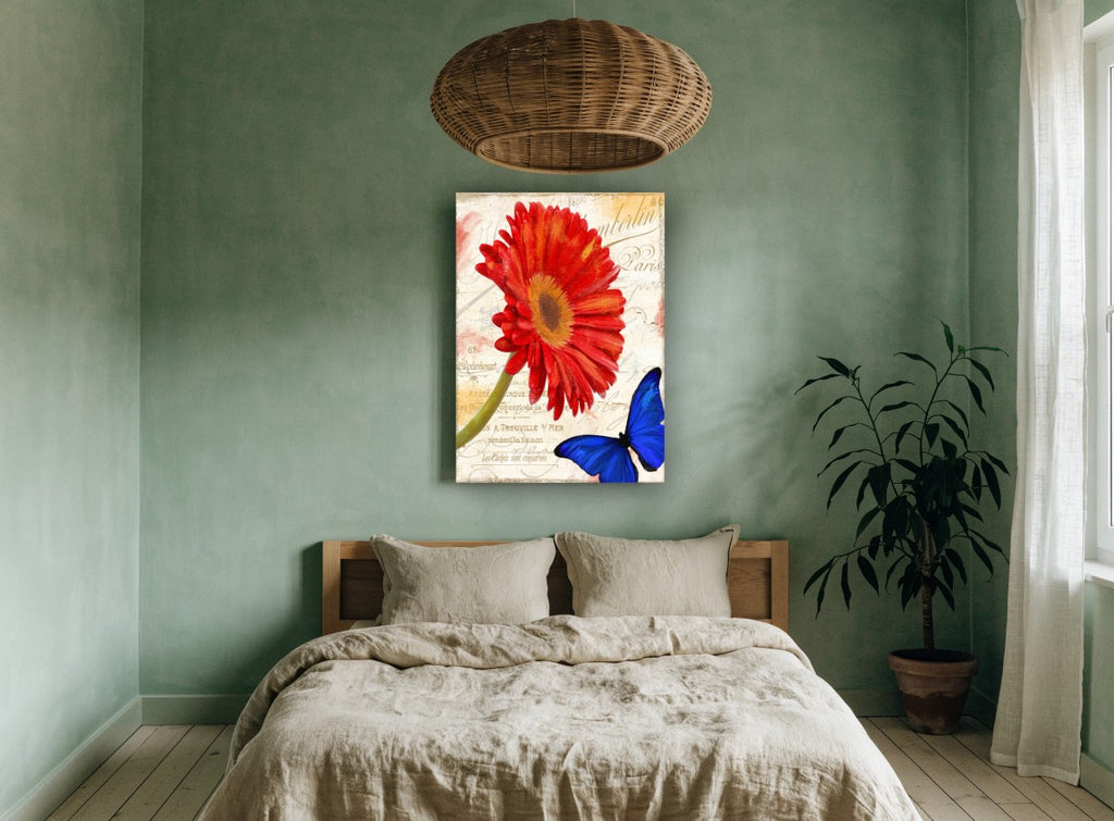 Red Gerbera and Blue Butterfly floral canvas print on the wall of a bedroom