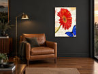 Red Gerbera and Blue Butterfly floral canvas print on the wall of a charcoal living room