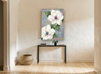 Magnolias on French Script floral canvas print on the wall of a hallway