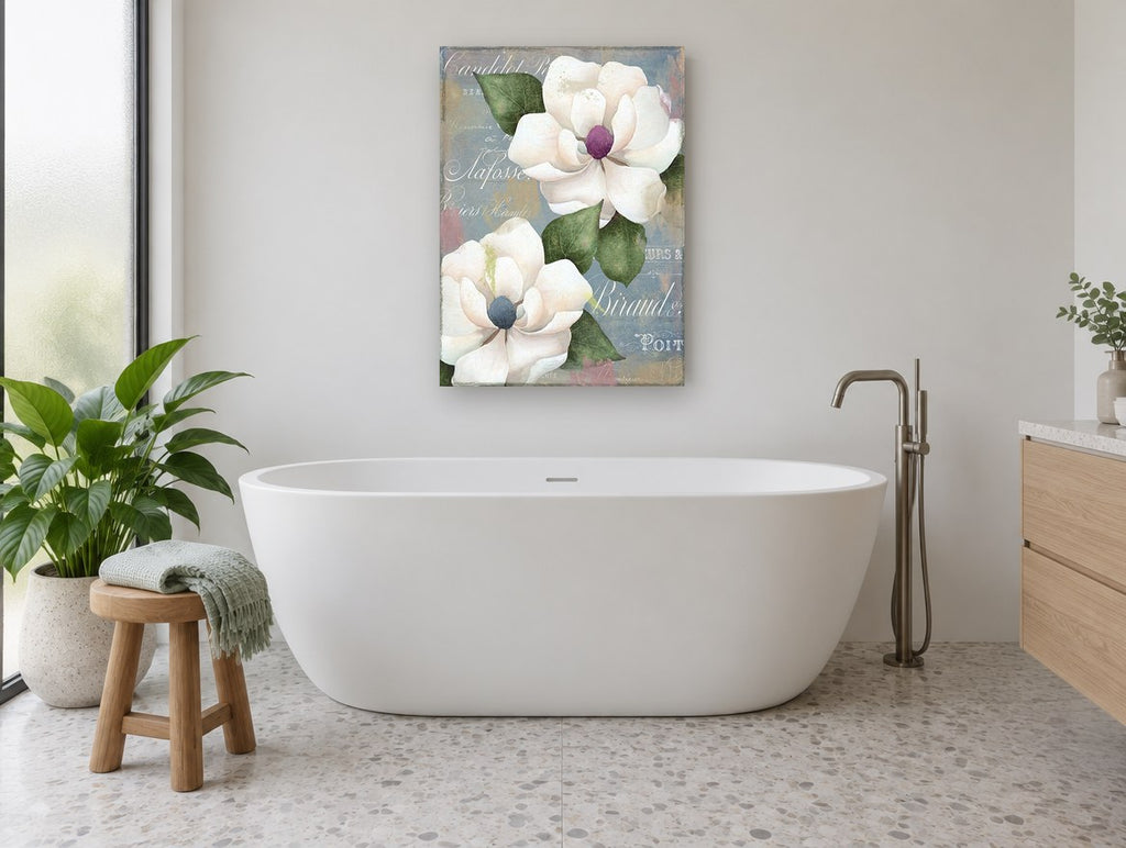 Magnolias on French Script floral canvas print on the wall of a bathroom
