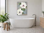 Magnolias on French Script floral canvas print on the wall of a bathroom