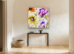 Script Garden Blooms floral canvas print on the wall of a hallway