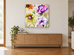 Script Garden Blooms floral canvas print on the wall of a living room above a sideboard