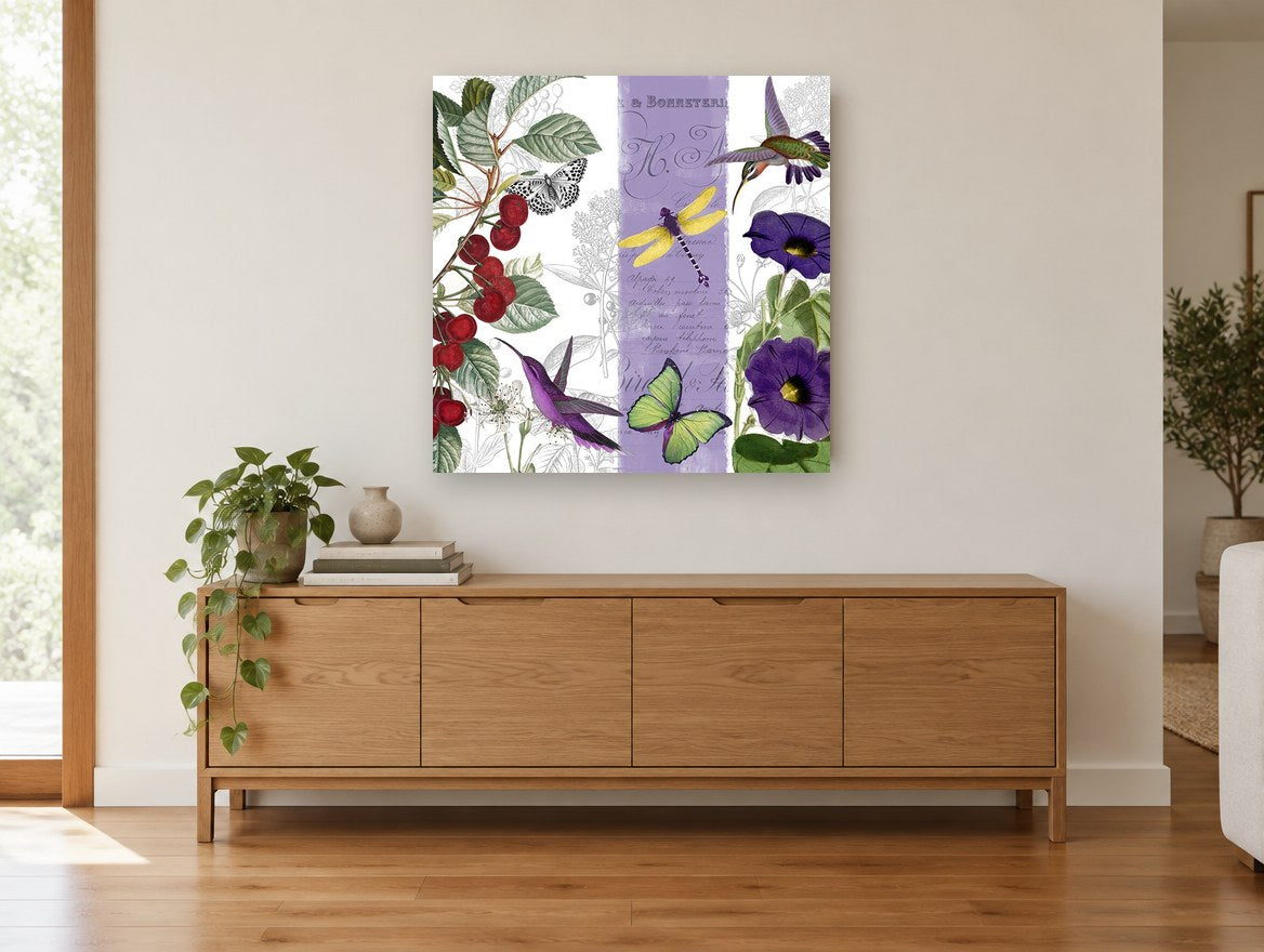 Cherries and Hummingbirds floral canvas print on the wall of a living room above a sideboard