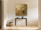 Pepper Vine Gold floral canvas print on the wall of a hallway
