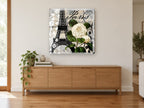 Camellia Over Paris floral canvas print on the wall of a living room above a sideboard