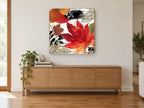 Autumn Maple Script floral canvas print on the wall of a living room above a sideboard