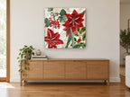 Red Amaryllis Winter Garden floral canvas print on the wall of a living room above a sideboard