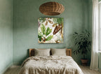 Snowy Oak and Pine floral canvas print on the wall of a bedroom