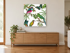 Birds and Butterflies Aloft floral canvas print on the wall of a living room above a sideboard