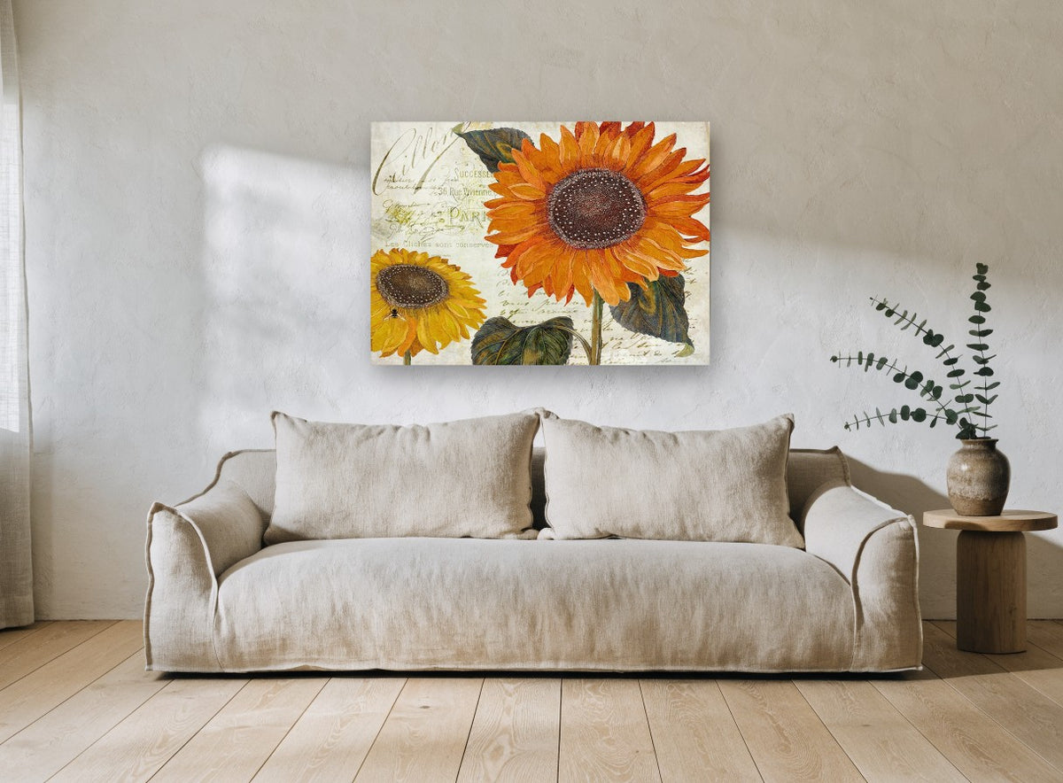 Sunflowers on French Script floral canvas print on the wall of a living room
