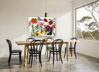 Poppies and Butterflies Meadow floral canvas print on the wall of a dining room