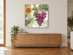 Sunflower and Grape Harvest floral canvas print on the wall of a living room above a sideboard