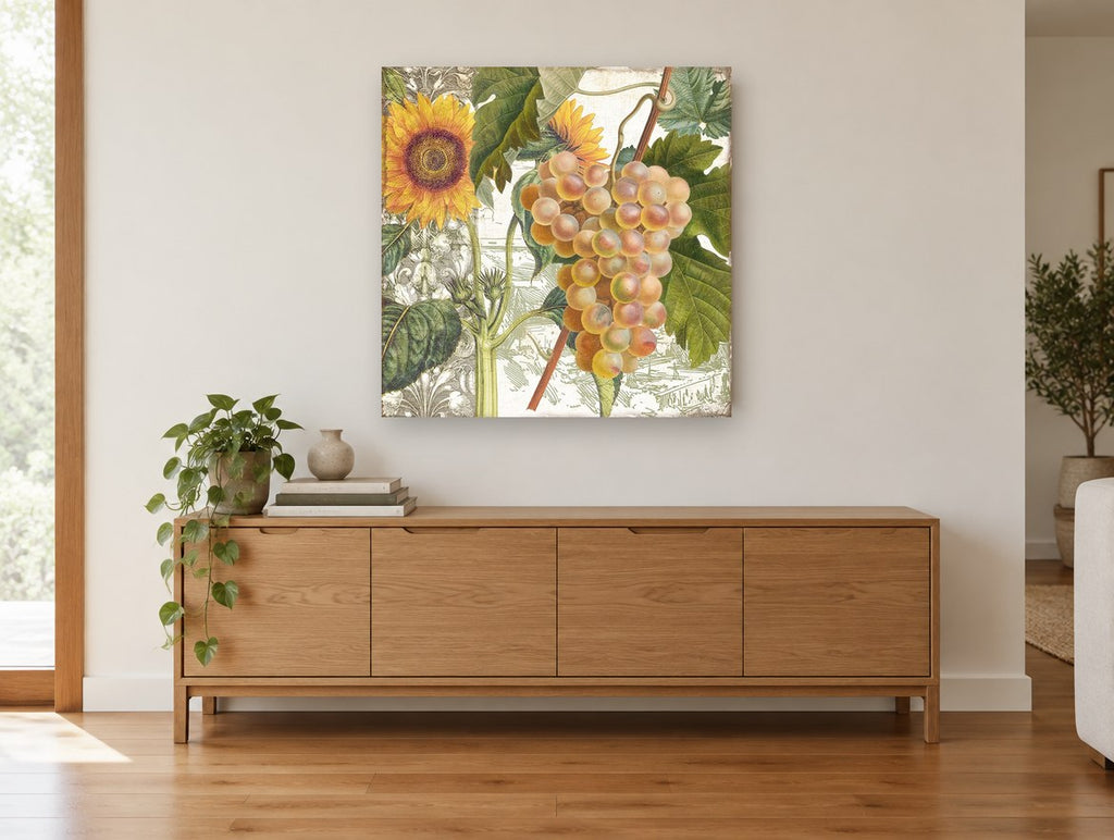 Sunflower and Grape Harvest floral canvas print on the wall of a living room above a sideboard