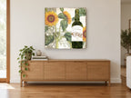 Sunflowers and Merlot floral canvas print on the wall of a living room above a sideboard
