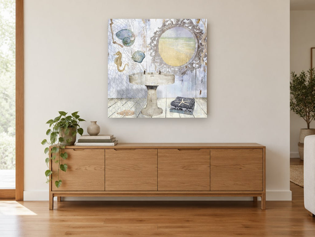 Seaside Washstand Mirror coastal canvas print on the wall of a living room above a sideboard