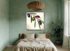 Olive Branch Trio floral canvas print on the wall of a bedroom