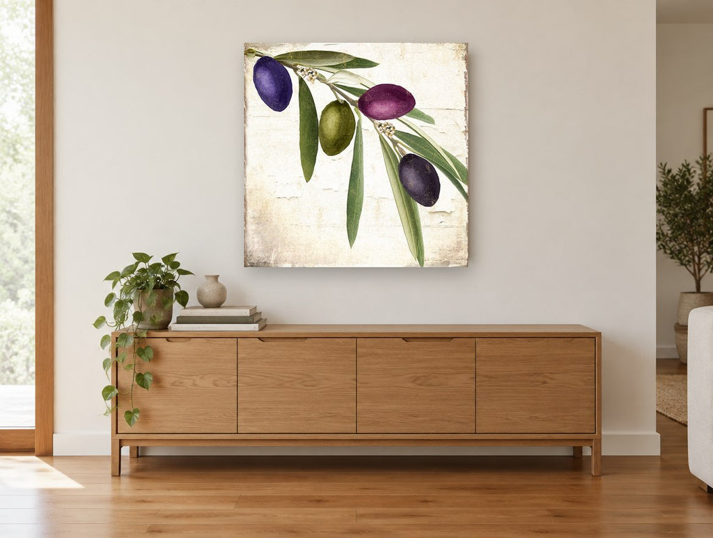 Olive Branch Trio floral canvas print on the wall of a living room above a sideboard