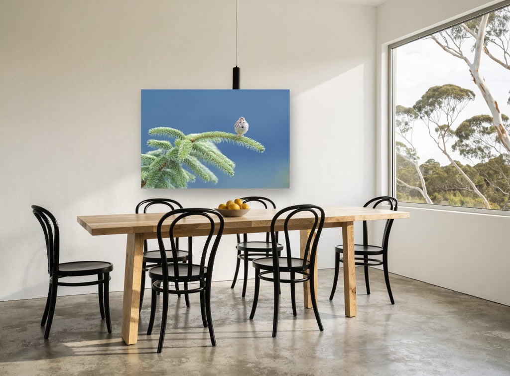 Sparrow on the Spruce floral canvas print on the wall of a dining room