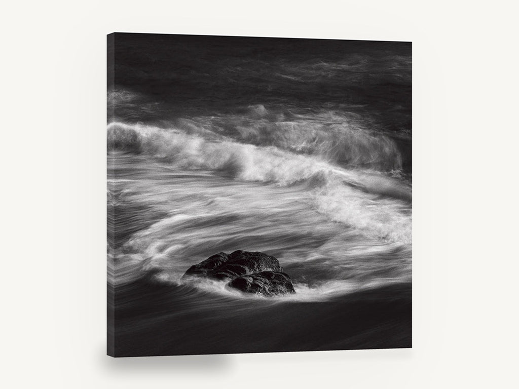 Rock in Swirling Surf, black and white wave rock photograph, coastal canvas wall art print ready to hang
