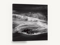Rock in Swirling Surf, black and white wave rock photograph, coastal canvas wall art print ready to hang