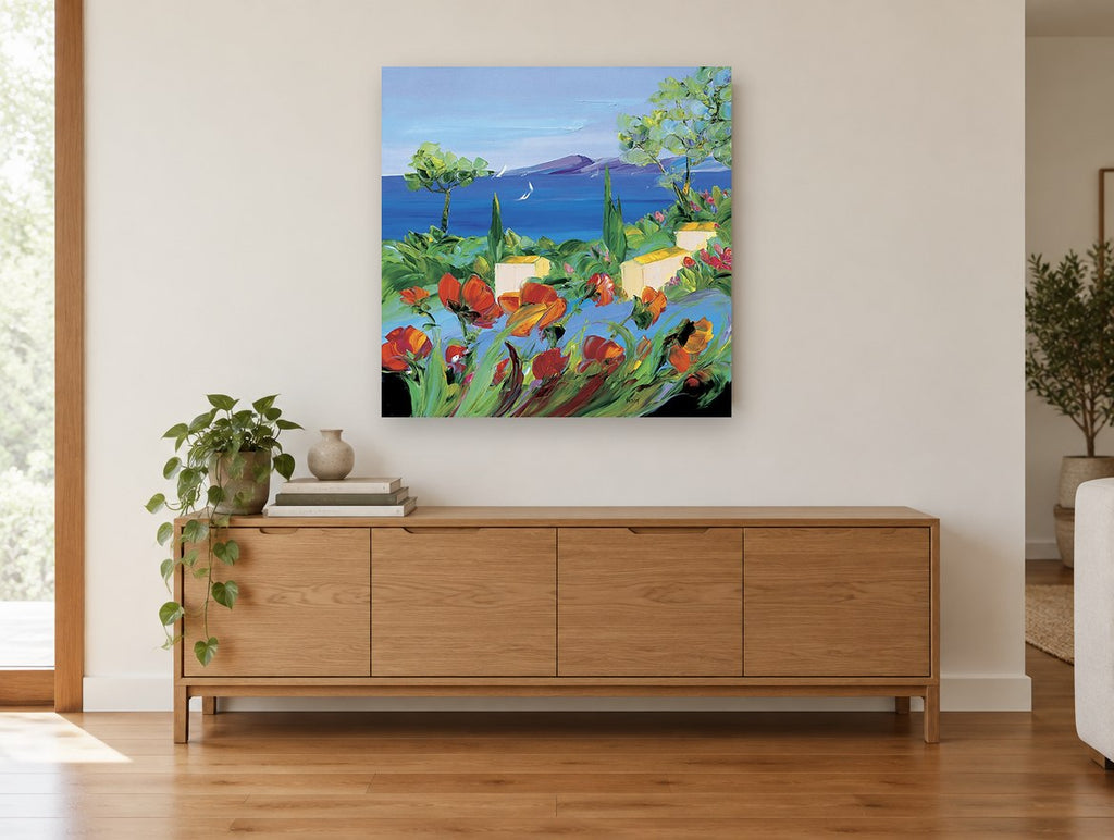 Poppies Above the Bay landscape canvas print on the wall of a living room above a sideboard