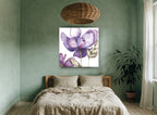 Lavender Petal Drift floral canvas print on the wall of a bedroom