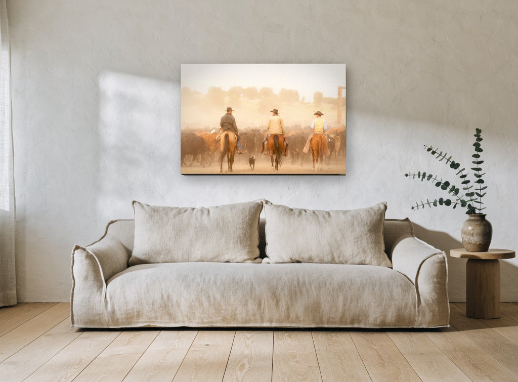 Dusty Cattle Drive animal canvas print on the wall of a living room