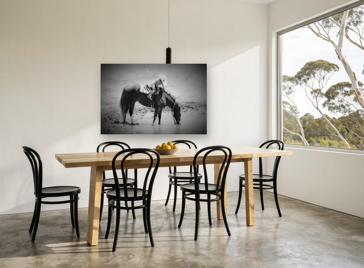 Waterhole Rest animal canvas print on the wall of a dining room