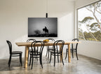 Lone Rider at Dusk landscape canvas print on the wall of a dining room