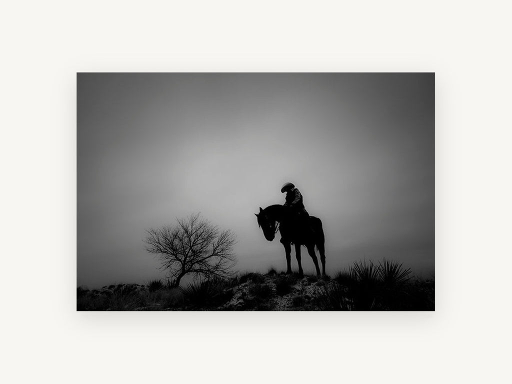 Lone Rider at Dusk, black and white horse rider photograph, landscape canvas wall art print, front view