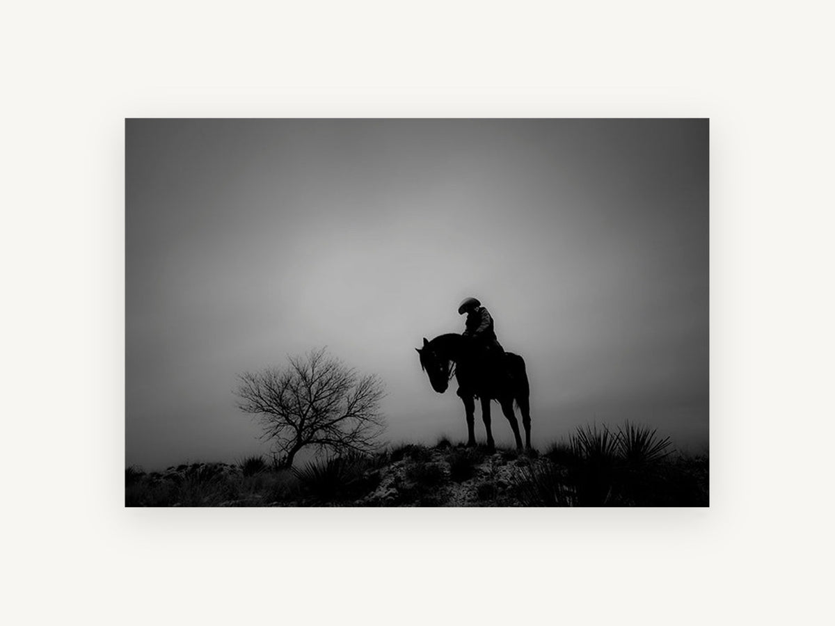 Lone Rider at Dusk, black and white horse rider photograph, landscape canvas wall art print, front view