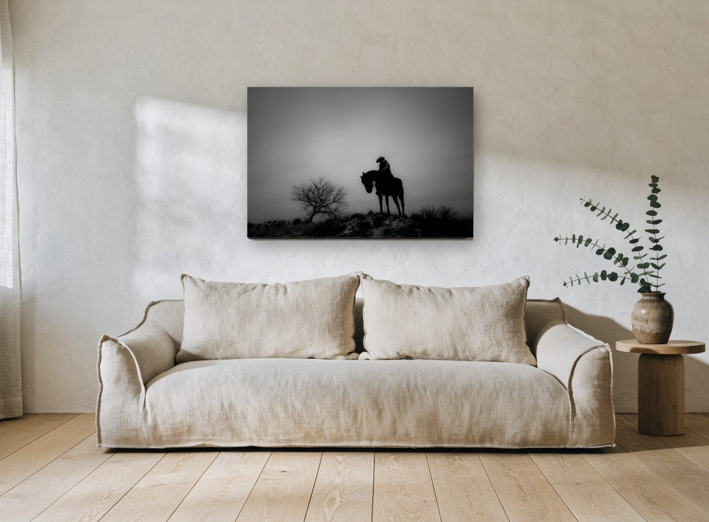 Lone Rider at Dusk landscape canvas print on the wall of a living room