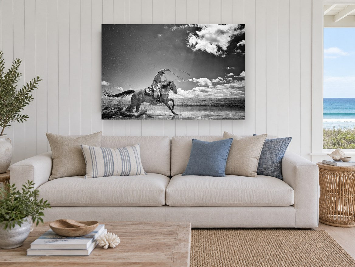 Galloping Through Shallows animal canvas print on the wall of a beach house living room
